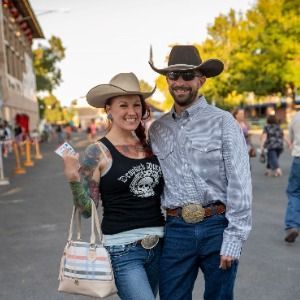 Cowboy couple on a date at the colorado state fair