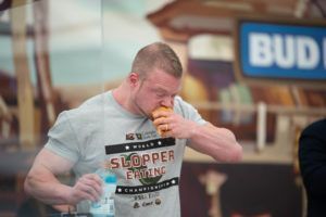 World Slopper Eating Championship contestant trying to finish his food