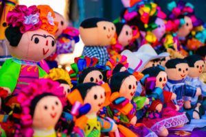 Colorful hand painted dolls at the Colorado State Fair Trade Show