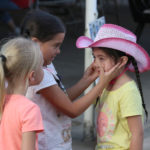 Little girls playing at the Colorado State Fair